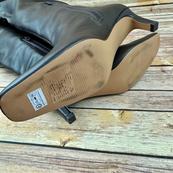 Elegant Brown Heeled Boots - Picture 7 of 9